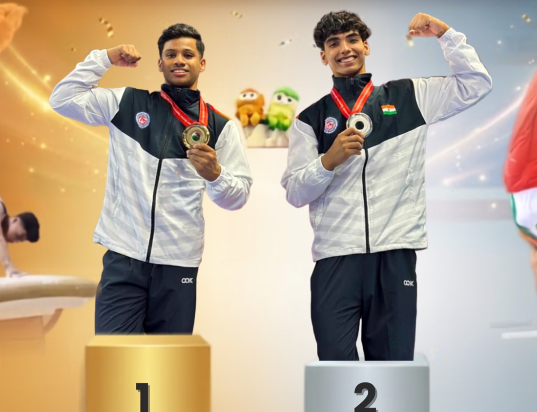 Harshit Damodharan and Akshat Bajaj on the vault podium with gold and silver medals